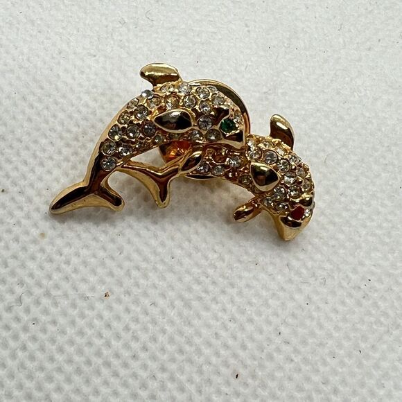 Gold Tone Dolphin Pair Clear Rhinestone Lapel Pin Green Red Rhinestone Eyes - Picture 2 of 7